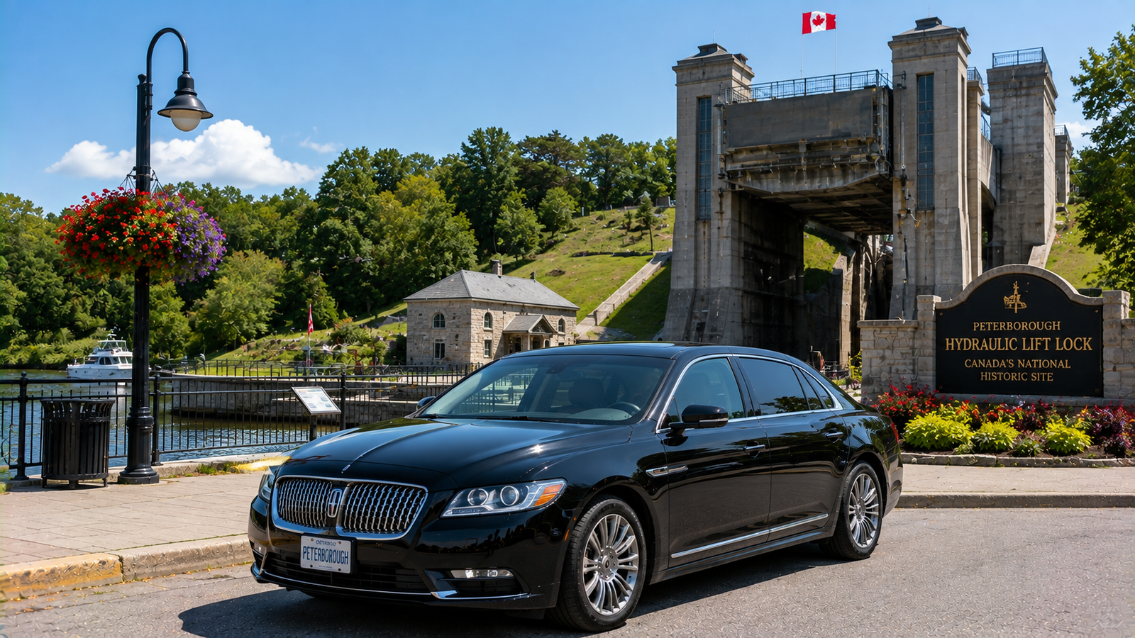 Glossy black sedan limo parked near the Peterborough Hydraulic Lift Lock.